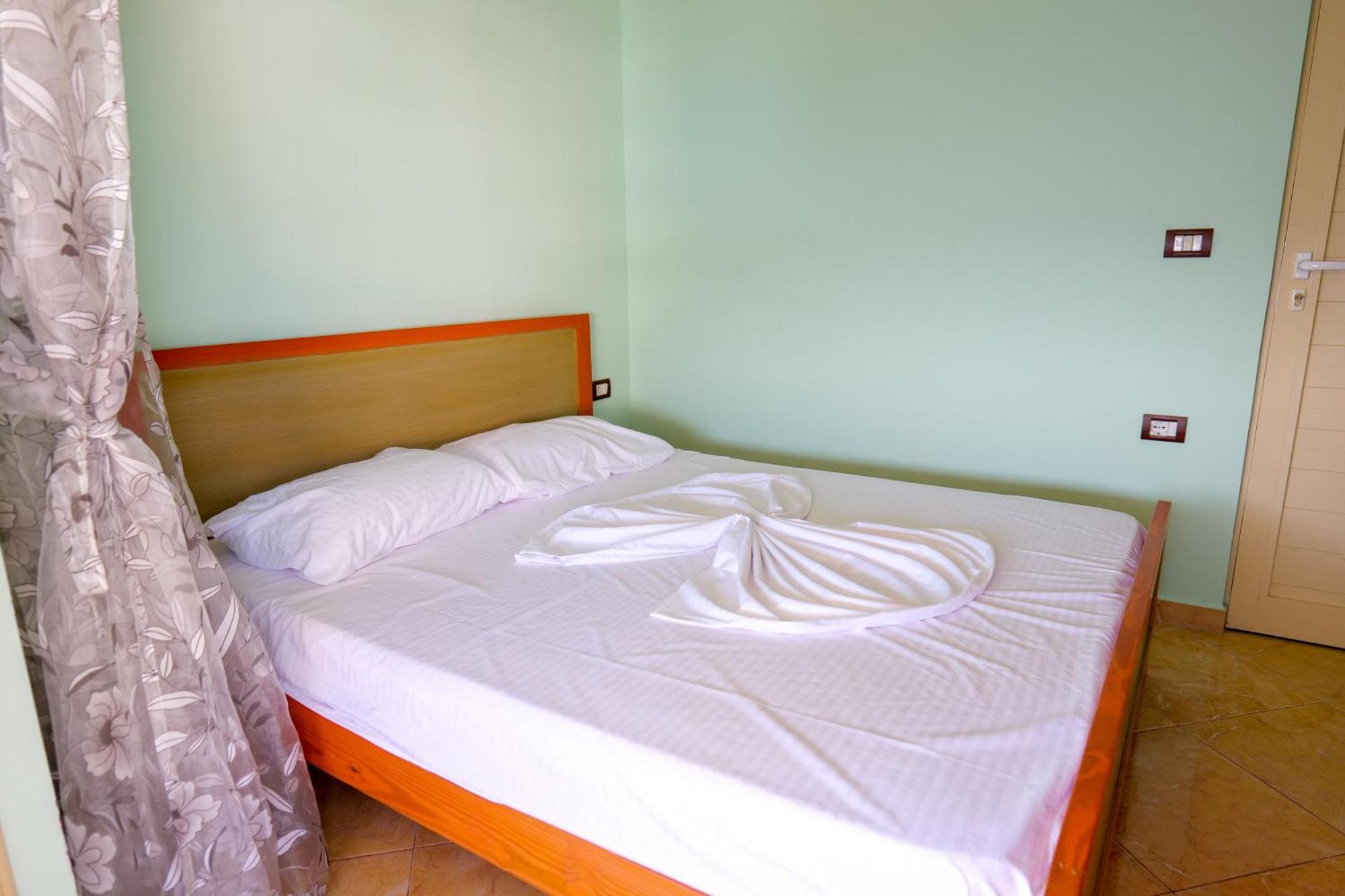 Rei Apartments Sarandë Pokoj fotografie